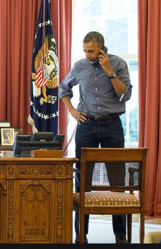 Obama On The Phone Talking To Russian President Vladimir Putin