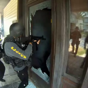 Police State - Men With Guns At Your Door - YouTube Screenshot